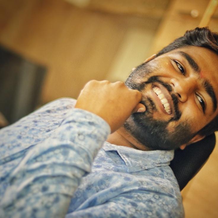 Kaveri Mehta, Lead Design Curator at Neutral Asset Matrix, reviewing corporate floral arrangements